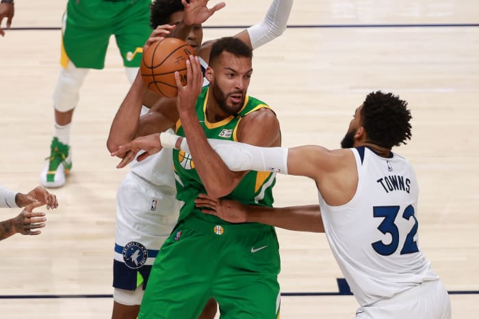 Rudy Gobert (27) and Karl Anthony Towns (32) will go head to head once again later this evening